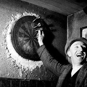 Playing darts in the local pub near Uckfield, Sussex. c. 1938