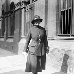 Policewoman patrolling (old dress) 1931