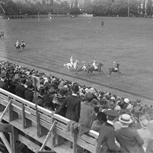 Polo at the Hurlingham Club. Spectators watching the play on the field. 19 May 1921
