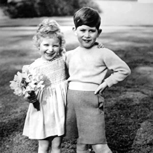 Prince Charles and his sister Princess Anne happy together in the garden of Royal Lodge