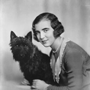 Princess Ingrid of Sweden with her pet dog. January 1930