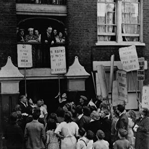 A protest meeting of tenants outside Quinn Square Building Bethnal Green London in