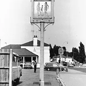 Pub sign for The Merry Maidens at Shinfield, Reading, England 1960s
