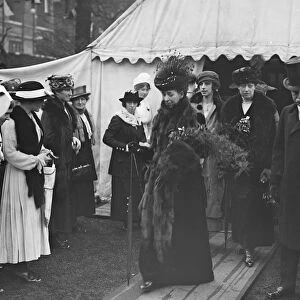 Queen Alexandra at nurses bazaar and fete at Devonshire house 1 May 1919