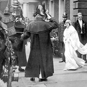 Queen Elizabeth then Lady Elizabeth Bowes Lyon about to enter the carriage in which