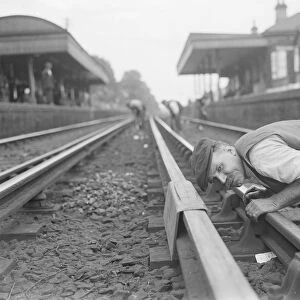 A railwayman gauging railway lines in Sidcup, Kent. 1937