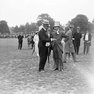 At the Richmond horse show, the King chatting to Lord Desborough. 10 June 1922
