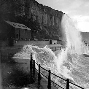 Rough seas at by the cliffs at Hastings, Kent. 1 February 1936