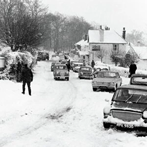 The Royal Oak Public House at the bottom of Crockham Hill in Kent with cars unable