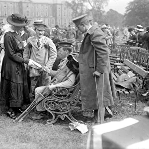 Royal visit to The West Riding. miss Vauce receives her bothers D. S. O. - showing