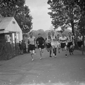 Runners from the Dartford Harriers during a road race. 25 October 1935