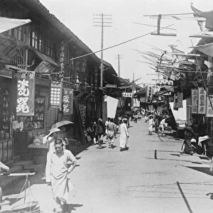 Shanghai. A street in the old quarter of the town. 17 June 1925