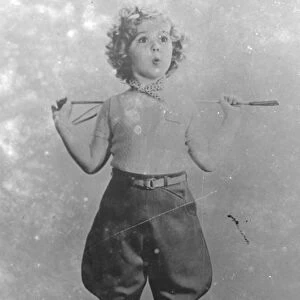 Shirley Temple Goes A - Riding Photo shows : Shirley Temple, the child film actress