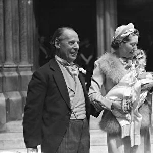 Sir William and Lady Garthwaite and their baby after the christening at St James