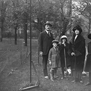 Society in the Park. Viscount and Viscountess Falkland in the Park with three of their children