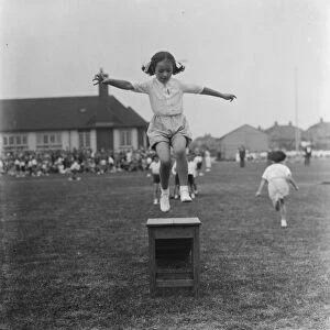 Sports day at the Days Lane Infant School in Sidcup, Kent. A little girl jumps