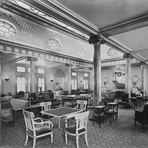 SS Paris The Lounge ( a row of pillars along centre of room, table with four chairs
