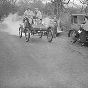 Full steam ahead in old crocks hill climb. Ancient cars, none later than 1904
