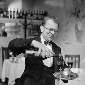 Stefan, the wine waiter at the de l Elysee in Percy Street, Soho, London, England 18