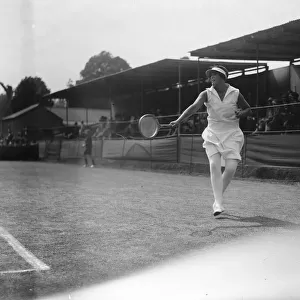 Surrey tennis championships at Surbiton. Miss Peggy Saunders in play. 19 May 1927
