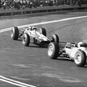 Syaracuse Sicily Jim Clark in a Lotus Climax followed by John Surtees in a Ferrari