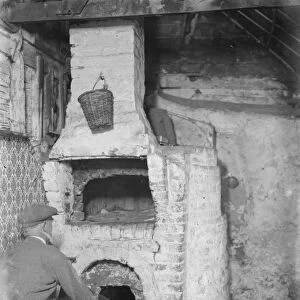 A tudor fire place in a building in Swanley, Kent. 1936