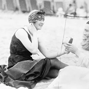 Vanity Fair Jack Pickford, the film star, holds his wifes vanity case up to