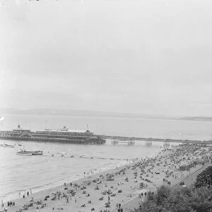 A view over Bournemouth showing the beach and pier. 1925