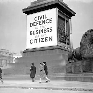 War Crisis, 1939. Air Raid precautions Civil Defence poster in Trafalgar Square