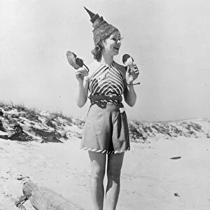 Warm weather brings nude beach fashion. A new summer beach fashion worn by Lorraine