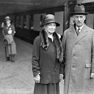 At Waterloo, Col and Mrs Stimson photographed prior to their departure for U. S. 28