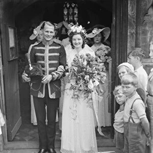The wedding of Mr Archie Percival Laurie Batsom RA and Miss Iris Ivy Gwen Kemp. The bride