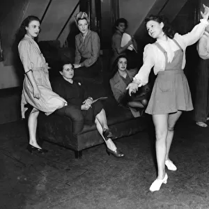 Windmill girls in 1946 dance / dancing / party season / celebration / happy vintage