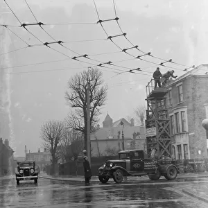 Workers from the Demolition and Construction Company Ltd use their Bedford Tram Tower