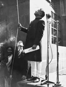 The part of Aldwych outside India House, London, presented a gay scene beneath the The part of Aldwych outside India House, London, presented a gay scene beneath the