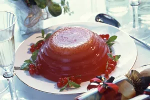 Alternative Christmas dessert - jelly (jello) of red berries set in fluted bowl Alternative Christmas dessert - jelly (jello) of red berries set in fluted bowl
