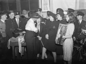 An Auxiliary Fire Service concert party in Dartford. Kent. Applying the make - up An Auxiliary Fire Service concert party in Dartford. Kent. Applying the make - up