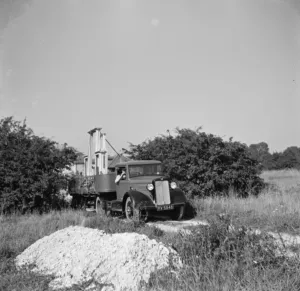 A bedford truck from Austin and Eastham Standard Joinery , driving to a job with A bedford truck from Austin and Eastham Standard Joinery , driving to a job with