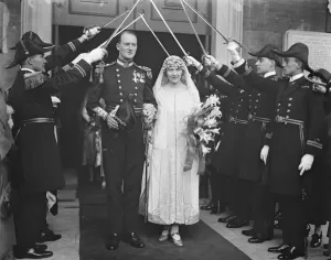 Bluejackets attend a Naval wedding Lt Commander E A Aylmer and miss P Evans were Bluejackets attend a Naval wedding Lt Commander E A Aylmer and miss P Evans were