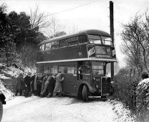 Bus blocks the road ten men tried to push the bus after it skidded right round near Bus blocks the road ten men tried to push the bus after it skidded right round near