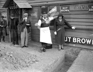 Cafe Fenced in Eltham, Kent. Mrs Whitney and son. 30 October 1934 Cafe Fenced in Eltham, Kent. Mrs Whitney and son. 30 October 1934