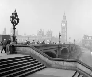 Cars and commuters making their way across Westminster Bridge towards Big Ben Cars and commuters making their way across Westminster Bridge towards Big Ben