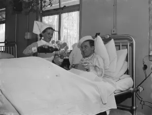 Celebrating Christmas at the Queens Hospital in Sidcup, Kent. Patient is poored Celebrating Christmas at the Queens Hospital in Sidcup, Kent. Patient is poored