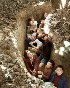 Children of hop pickers watch the Battle of Britain rage overhead, Kent 1940 colourised Children of hop pickers watch the Battle of Britain rage overhead, Kent 1940 colourised