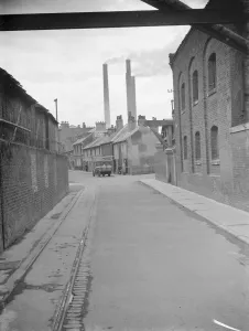 The chimneys at the cement factory on Northfleet Street in Northfleet, Kent, pour The chimneys at the cement factory on Northfleet Street in Northfleet, Kent, pour