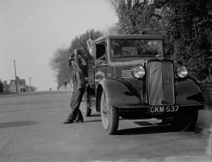 Coal delivery by one of the coal vans from T Denness, Coal and Coke Merchants in Coal delivery by one of the coal vans from T Denness, Coal and Coke Merchants in