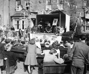 Coronation street party 6th June 1953 They built a stage in their street at Bedford Coronation street party 6th June 1953 They built a stage in their street at Bedford