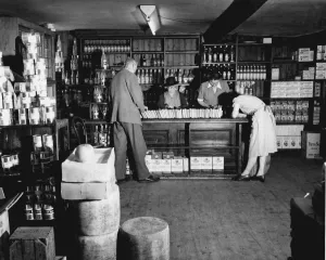 The country library opened once a week at the village shop Chilham. 7/7/1950 Kent The country library opened once a week at the village shop Chilham. 7/7/1950 Kent