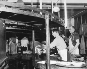 Deep below the kitchens the endless conveyors bring endless quantities of dirty dishes Deep below the kitchens the endless conveyors bring endless quantities of dirty dishes