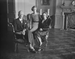 The Earl and Countess of Bessborough photographed at his London house, with their The Earl and Countess of Bessborough photographed at his London house, with their